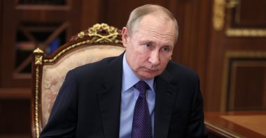 Russian President Vladimir Putin listens during a meeting in Moscow, Russia, Dec. 30, 2021. (AP Photo)