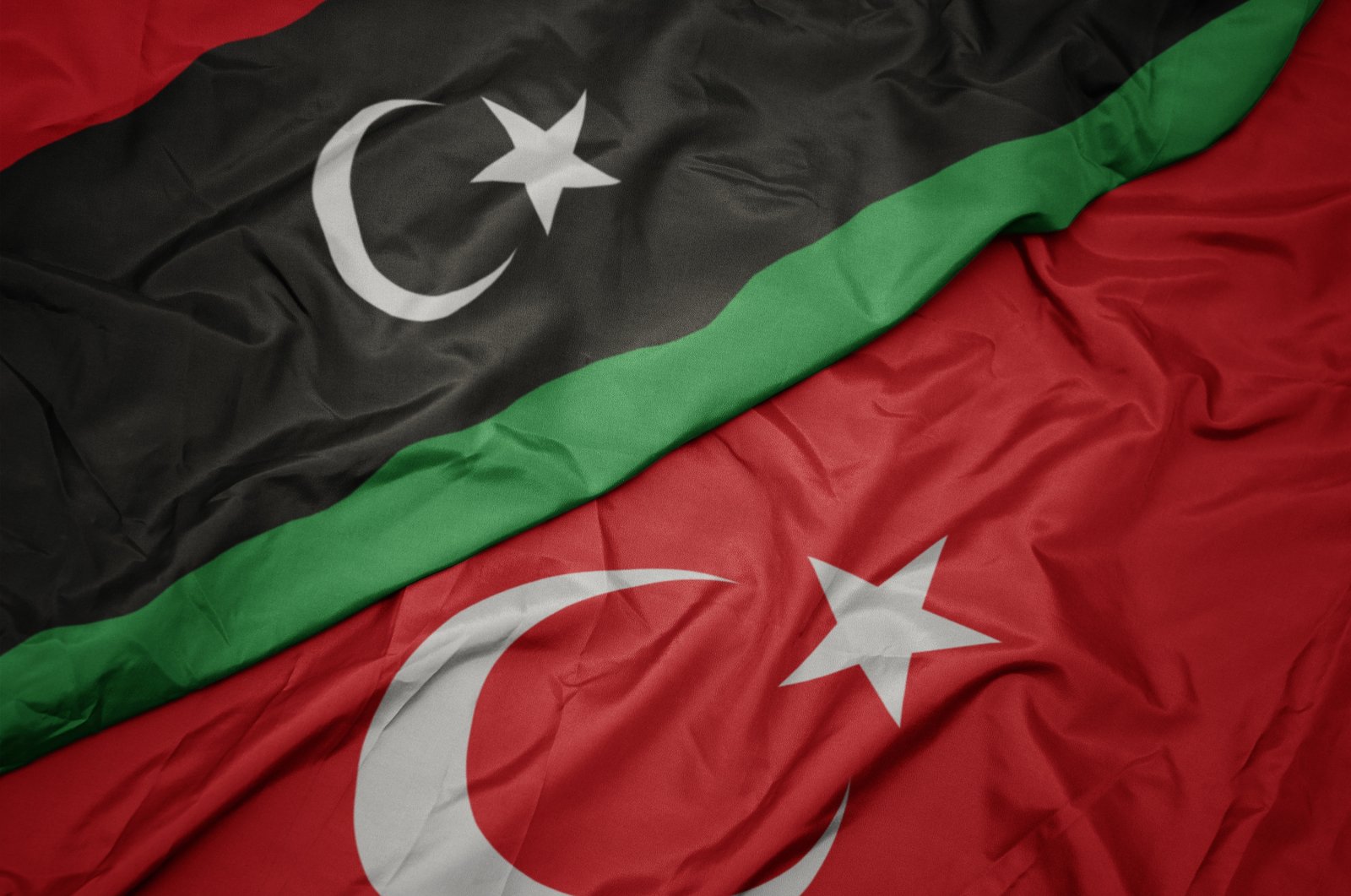 The flags of Turkey and Libya. (Shutterstock File Photo)