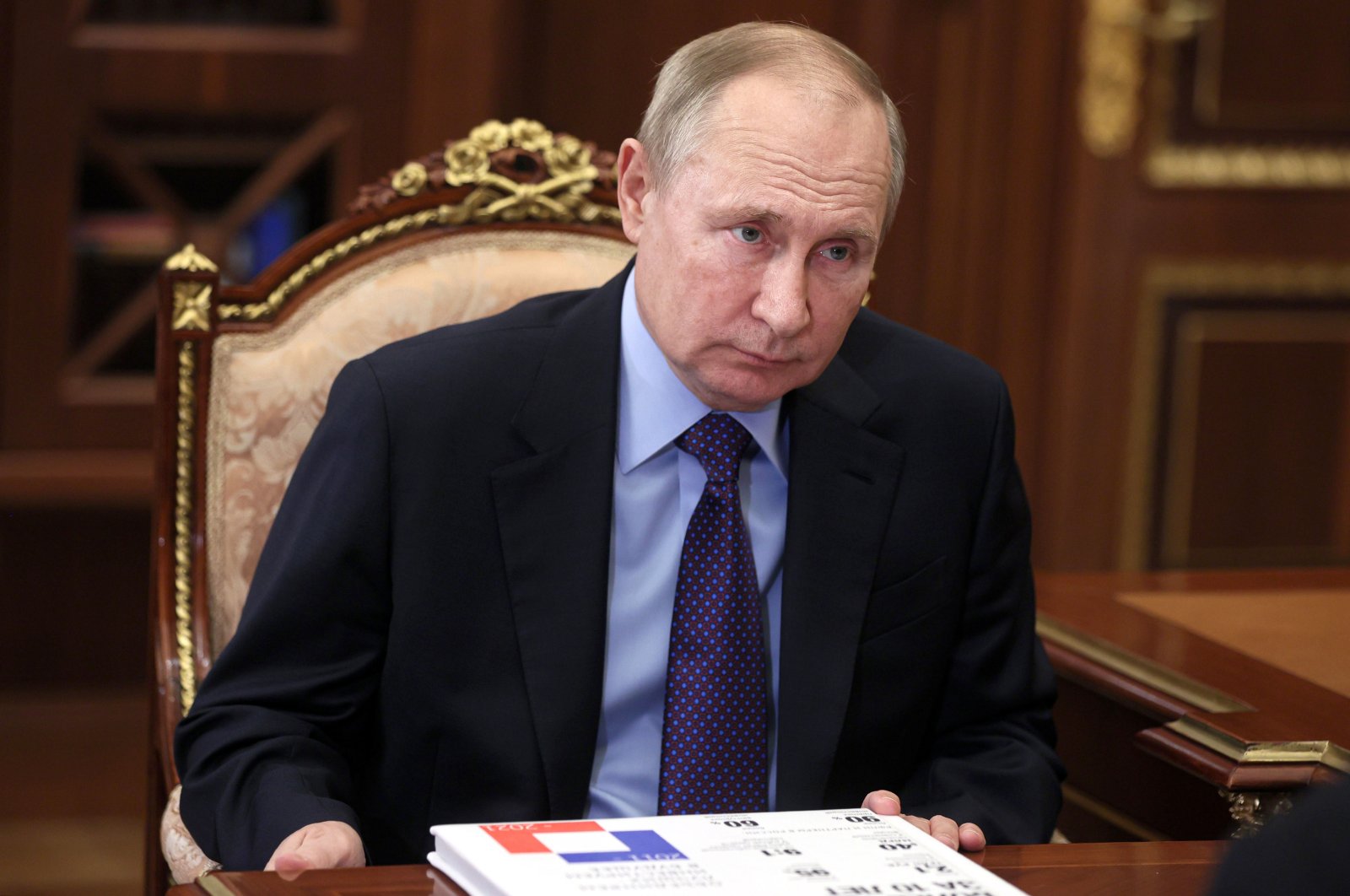 Russian President Vladimir Putin listens during a meeting in Moscow, Russia, Dec. 30, 2021. (AP Photo)
