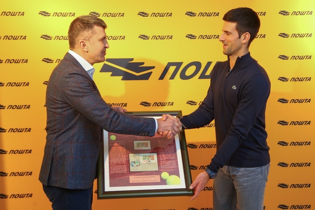 Serbia's Novak Djokovic (R) attends a ceremony to honor him with stamps bearing his image, Belgrade, Serbia, Dec. 15, 2021. (Novak Djokovic on Instagram)