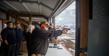 Mark Cerchione of Double Tapp firing range, fires the LodeStar 9mm smart gun that works only for the designated user, during a presentation for shareholders and potential investors in Boise, Idaho, U.S., Jan. 7, 2022. (Reuters Photo)