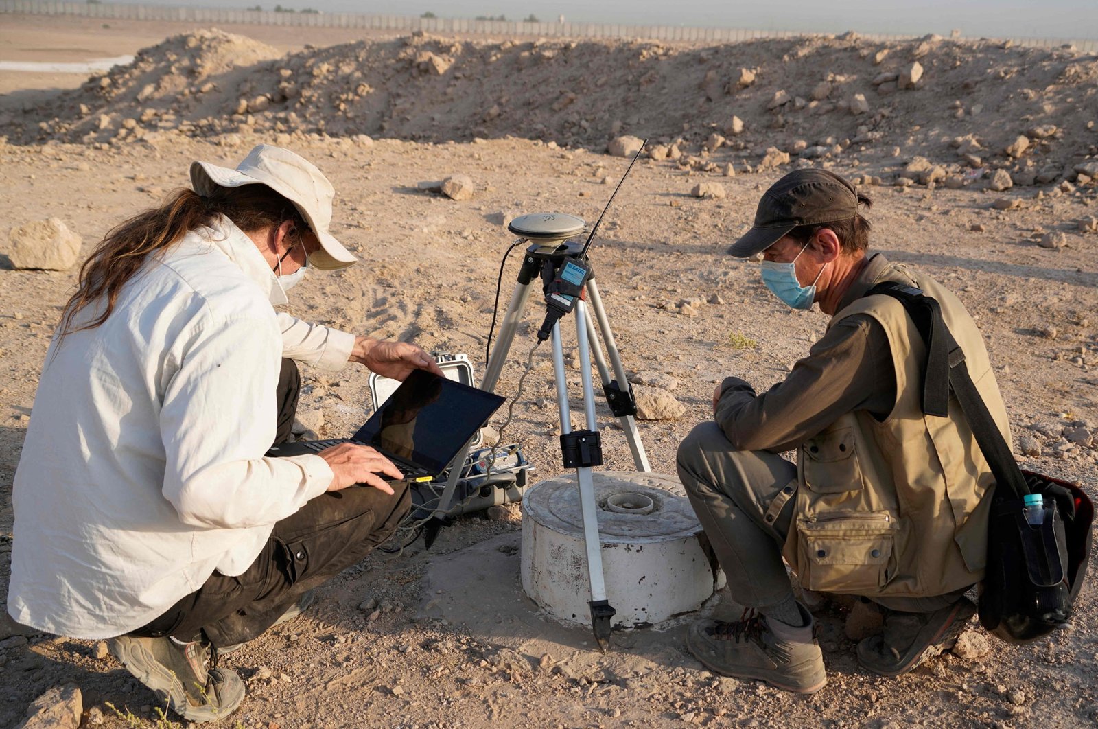 Members of a German-Iraqi archaeological expedition follow up on geophysical survey at the ancient site of Al-Hirah, south of the holy city of Najaf, Iraq, Oct. 24, 2021. (AFP Photo)