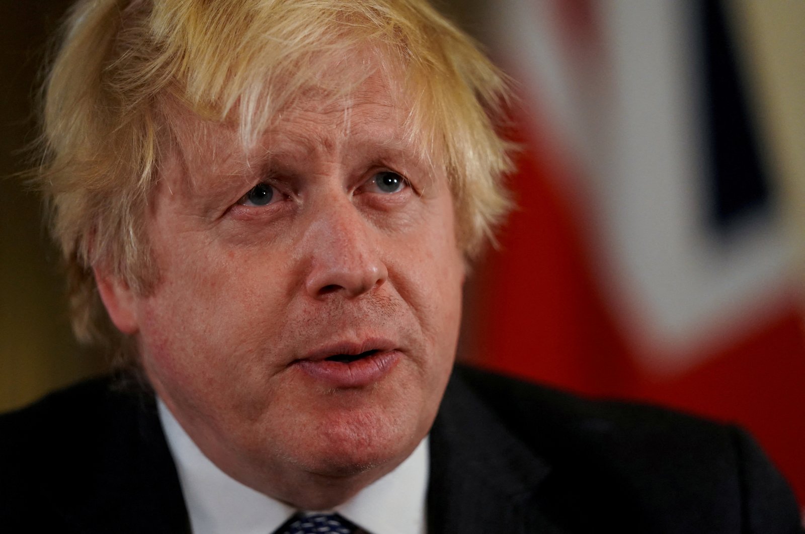 British Prime Minister Boris Johnson records an address to the nation, to provide an update on the booster vaccine COVID-19 program at Downing Street, London, Britain, Dec. 12, 2021. (Reuters File Photo)