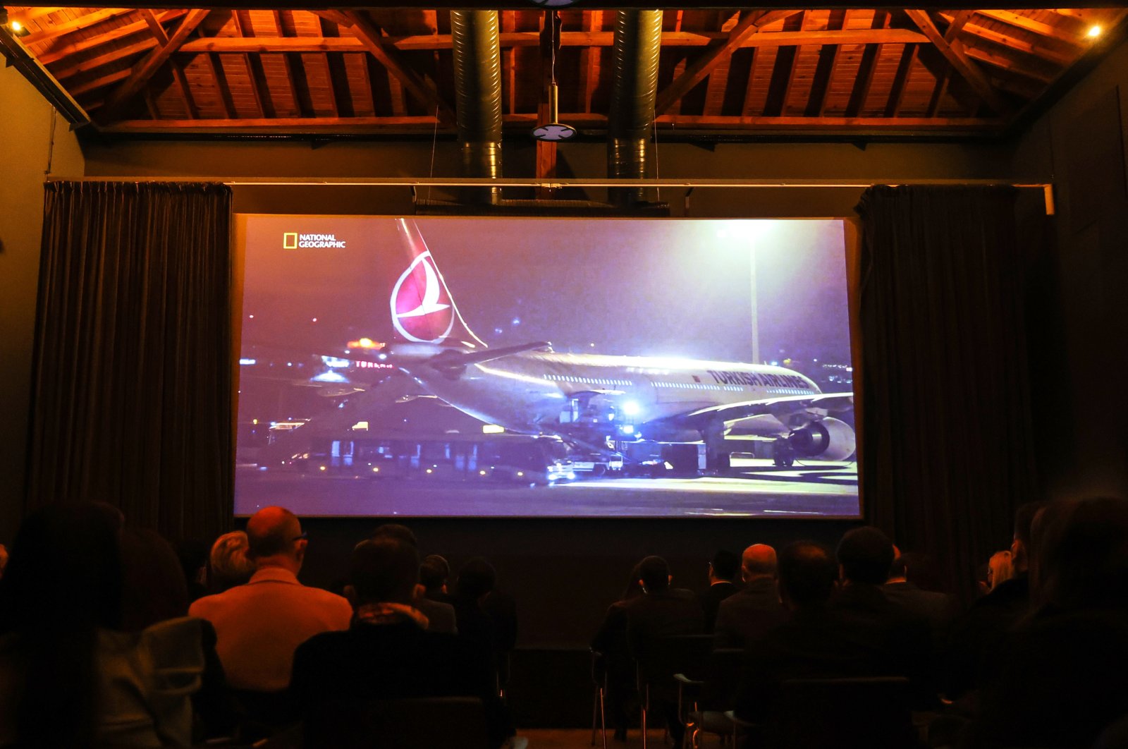 A screen shows Turkish Airlines aircraft during the premiere of "The Great Move" documentary, Istanbul, Turkey, Jan. 12, 2021. (AA Photo)