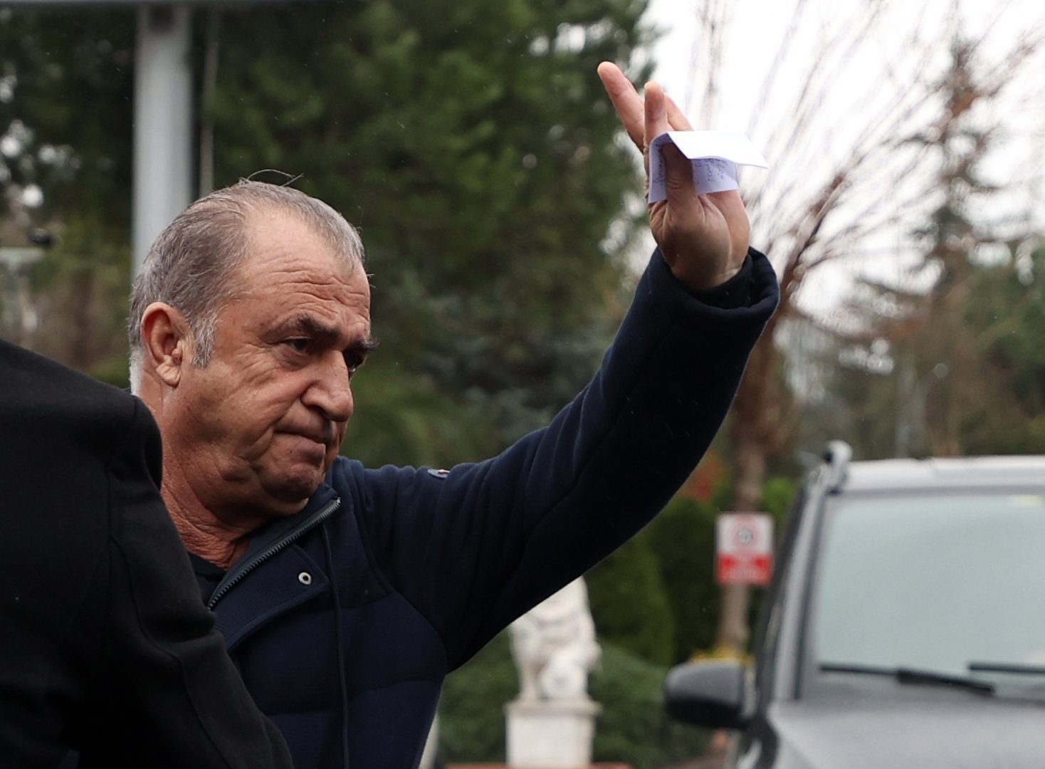 Galatasaray coach Fatih Terim waves at fans as he leaves the club&#039;s Metin Oktay training ground in Istanbul&#039;s Florya, Jan. 11, 2022 (AA Photo)