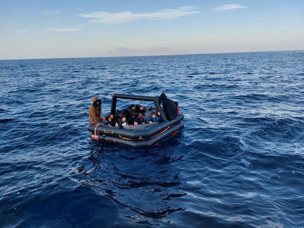 A boat carrying irregular migrants is rescued by Turkish coast guard units off the coast of Muğla province&#039;s Bodrum district, Turkey, Jan. 4, 2022. (IHA Photo)