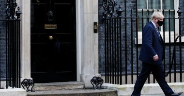 British Prime Minister Boris Johnson walks outside Downing Street in London, Britain, Jan. 12, 2022. (Reuters Photo)