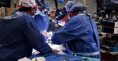 Surgeon Bartley P. Griffith, MD leads a team conducting a successful transplant of a genetically-modified pig heart on David Bennett, at University of Maryland Medical Center in Baltimore, Maryland, U.S., Jan. 7, 2022. (UMSOM via Reuters)