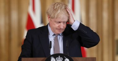 Britain's Prime Minister Boris Johnson reacts during a press conference on the government's coronavirus action plan, at Downing Street, London, U.K., March 3, 2020. (AP Photo)