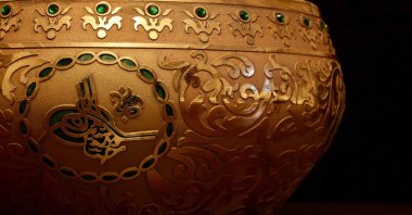 A metal vessel with traditional tughra of Ottoman sultans. (Shutterstock) 