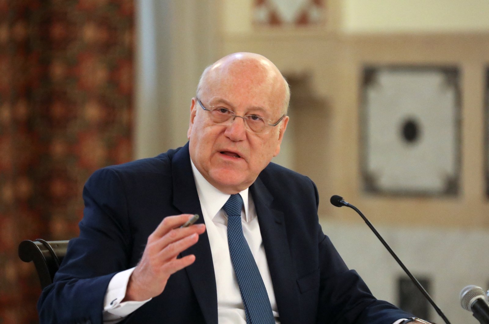 Lebanese Prime Minister Najib Mikati gestures during a news conference on the latest developments in the country, at the governmental palace in Beirut, Lebanon, Dec. 28, 2021. (Reuters File Photo)