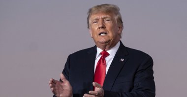 Former President Donald Trump prepares to take the stage during a rally in Perry, Georgia, U.S., Sept. 25, 2021. (AP Photo)