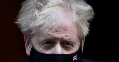 British Prime Minister Boris Johnson walks outside Downing Street in London, U.K., Jan. 12, 2022. (Reuters Photo)