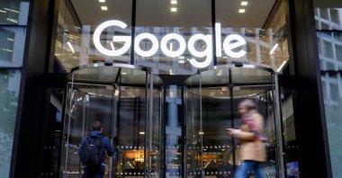 In this file photo taken on Nov. 1, 2018, pedestrians walk past Google's U.K. headquarters in London. (AFP Photo)
