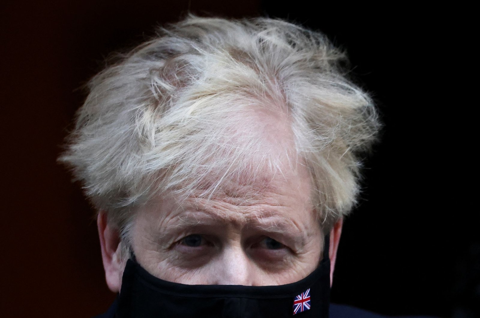 British Prime Minister Boris Johnson walks outside Downing Street in London, U.K., Jan. 12, 2022. (Reuters Photo)