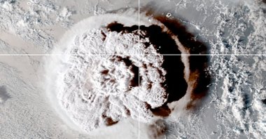 The eruption of an underwater volcano off Tonga, which triggered a tsunami warning for several South Pacific island nations, is seen in an image from the NOAA GOES-West satellite taken at 5 a.m. GMT Jan. 15, 2022. (CIRA/NOAA/Handout via Reuters)