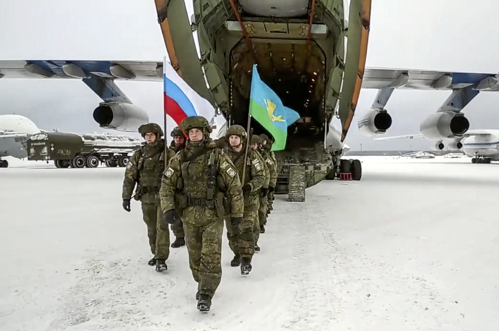 Russian peacekeepers of the Collective Security Treaty Organization (CSTO) leave a Russian military plane after withdrawing its troops at an airport outside Ivanovo, Russia, Jan. 15, 2022. (AP Photo)