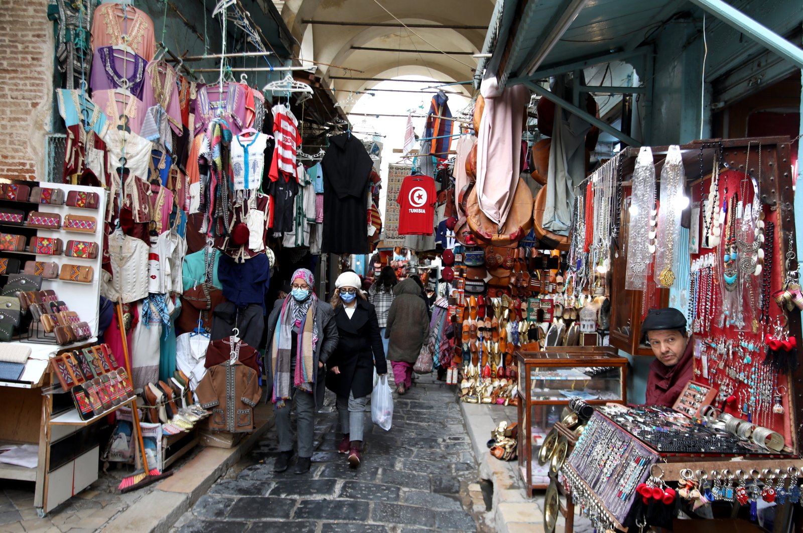 People shop in the old city in Tunis, Tunisia, Jan. 13, 2022. (EPA Photo)