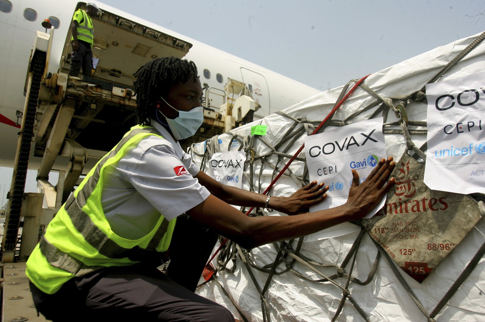 A shipment of COVID-19 vaccines distributed by the COVAX Facility arrives in Abidjan, Ivory Coast, Feb. 25, 2021. (AP Photo)