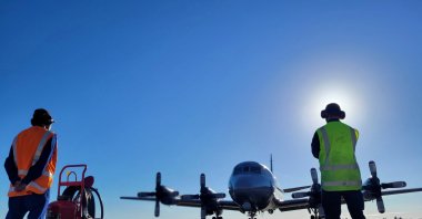 A Royal New Zealand Air Force Orion aircraft prepares to leave Base Auckland for Tonga to assist in an initial impact assessment of the area and low-lying islands after the Pacific island nation was hit by a tsunami triggered by a massive undersea volcanic eruption, Jan. 17, 2022. (REUTERS)