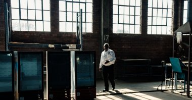 The owner of Imperial Refrigeration, Callisto Jokonya, stands in his refrigerator manufacturing factory in Harare, Zimbabwe, Dec. 13, 2021. (AFP Photo)