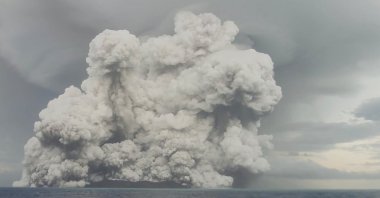 A screenshot from a social media video shows an eruption at the underwater volcano Hunga Tonga-Hunga Ha'apai off Tonga, Jan. 14, 2022. (Tonga Geological Services/via Reuters)