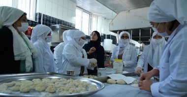 The all-women cooperative supported by the Ministry of Trade work in their kitchen in the city&#039;s technopolis, Şanlıurfa, southeastern Turkey, Jan. 16, 2022. (IHA Photo)