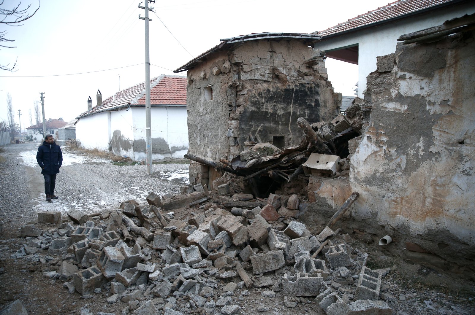 A view of a wall which collapsed during the earthquake in Sarıoğlan, in Kayseri, central Turkey, Jan. 18, 2022. (AA PHOTO)