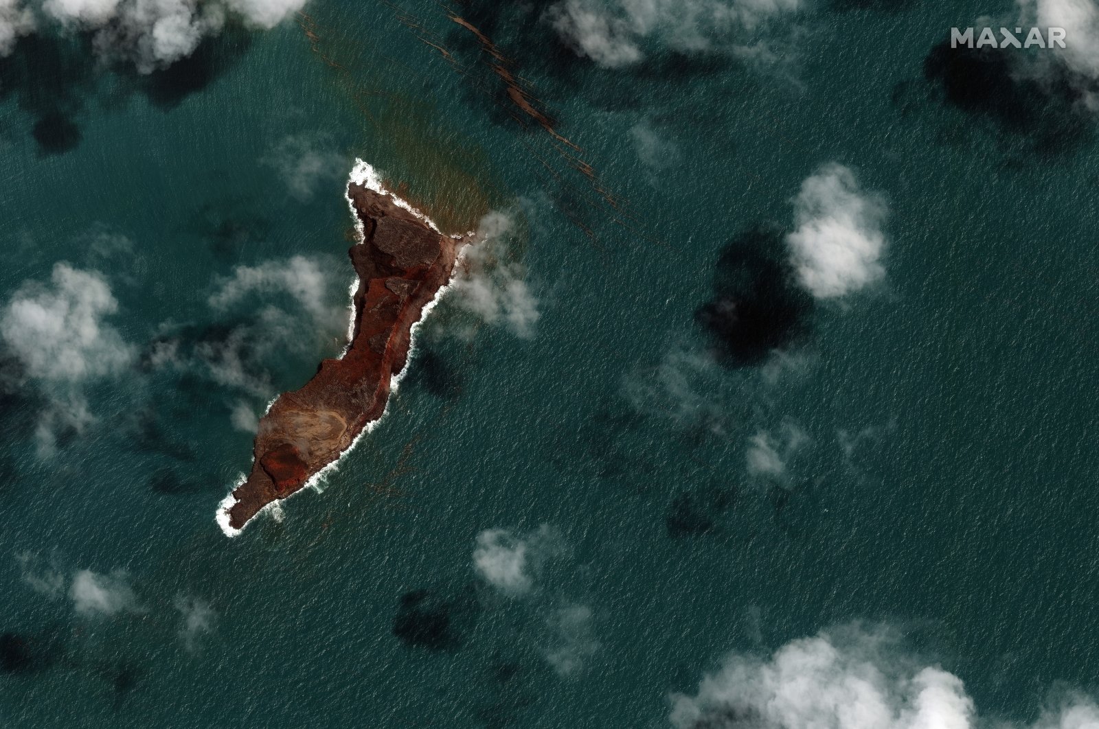 This satellite image by Maxar Technologies shows a view of Hunga Tonga Hunga Ha’apai volcano in Tonga, Jan. 18, 2022 after a huge undersea volcanic eruption. (AP Photo)