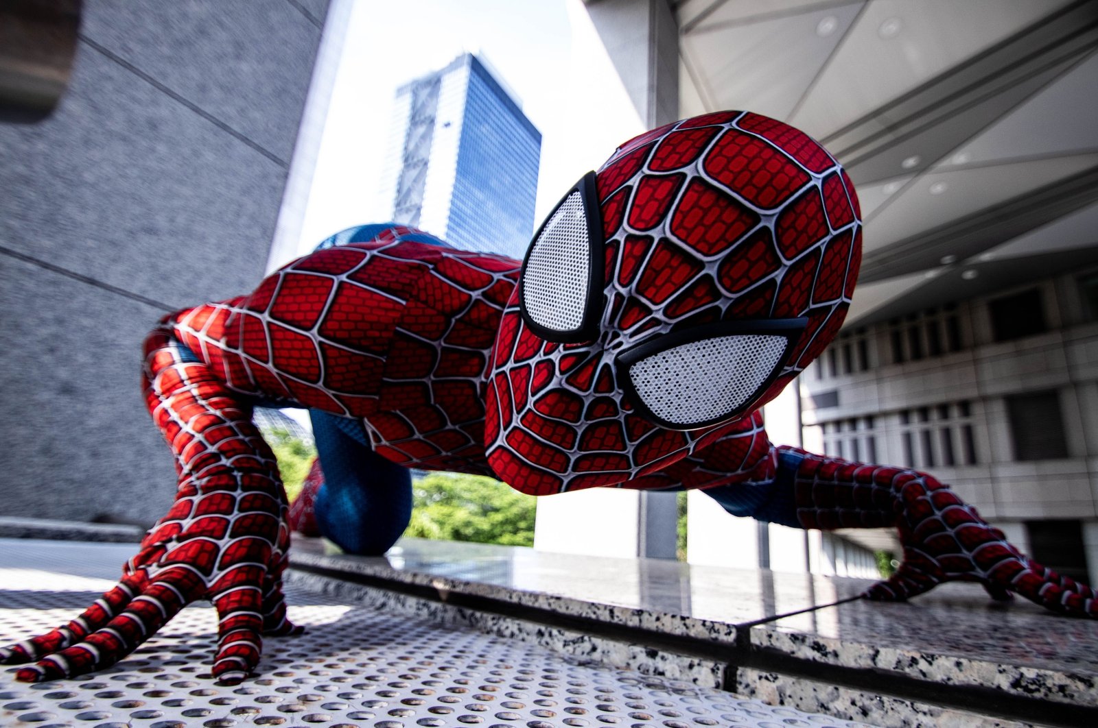 A man in superhero costume comic marvel Spider-Man on the street, Tokyo, Japan, June 15, 2019. (Photo by Shutterstock)