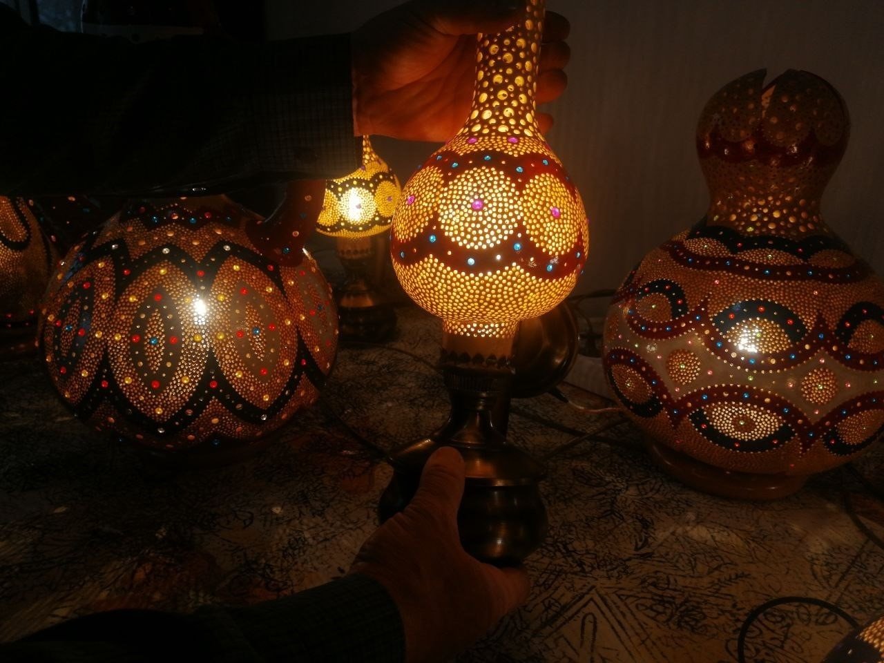 Calabash (bottle gourd) lamps handmade by Serdar Takuçin, Elazağı, eastern Turkey, Jan. 18, 2022. (IHA Photo)