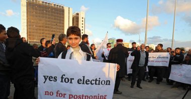 Libyans demonstrate against the postponement of the elections in the city of Benghazi, Libya, Dec. 24, 2021. (AFP Photo)