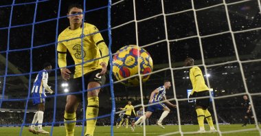 Brighton&#039;s Adam Webster (2nd L) celebrates scoring a goal as Chelsea&#039;s Thiago Silva reacts in a Premier League match, Brighton, England, Jan. 18, 2022. (Reuters Photo)