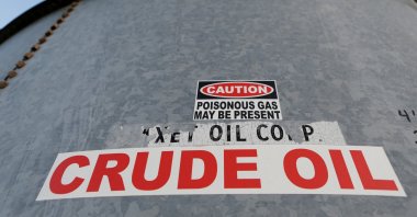 A sticker reads crude oil on the side of a storage tank in the Permian Basin in Mentone, Loving County, Texas, U.S., Nov. 22, 2019. (Reuters Photo)