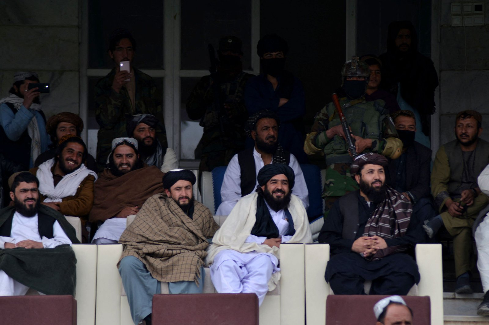 Taliban officials watch the football match between the Kabul Shaheen Asmayee and Toofan Harirod of Herat at Kandahar Stadium in Kandahar, Afghanistan, Jan. 18, 2022. (AFP Photo)