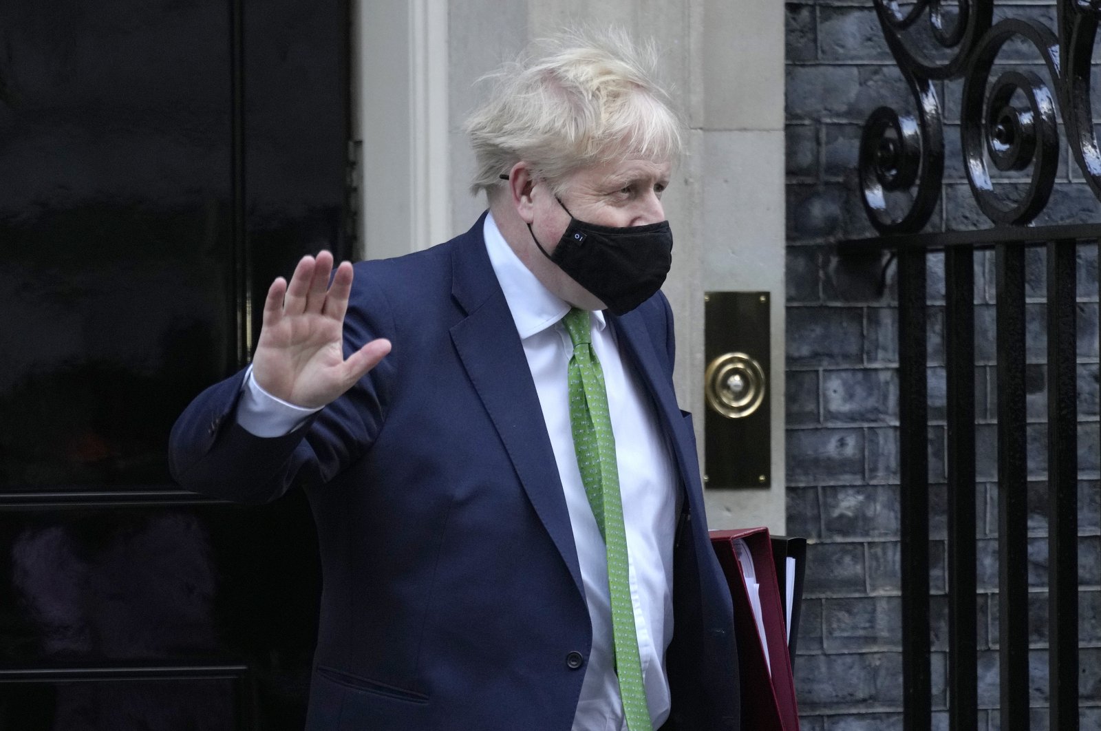 Britain&#039;s Prime Minister Boris Johnson leaves 10 Downing Street to attend the weekly session of Prime Minister&#039;s Questions in Parliament in London, England, Jan. 19, 2022. (AP Photo)