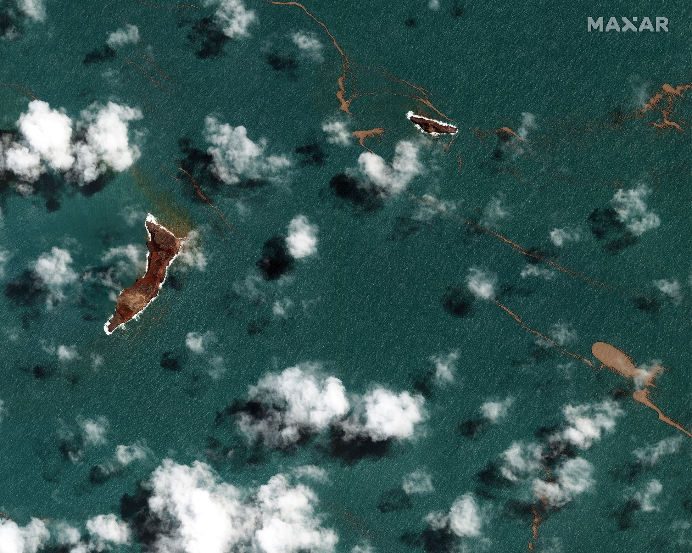 Gambar satelit menunjukkan pemandangan umum gunung berapi Hunga Tonga Hunga Ha'apai setelah letusan gunung berapi bawah laut yang besar, di Tonga, 18 Januari 2022. (Maxar Technologies via AP)