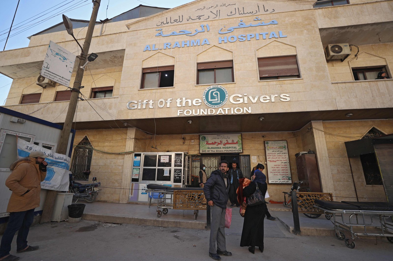 People are pictured outside the al-Rahma Hospital in the town of Darkush, Idlib province, northwestern Syria, Jan. 16, 2022. (AFP Photo)