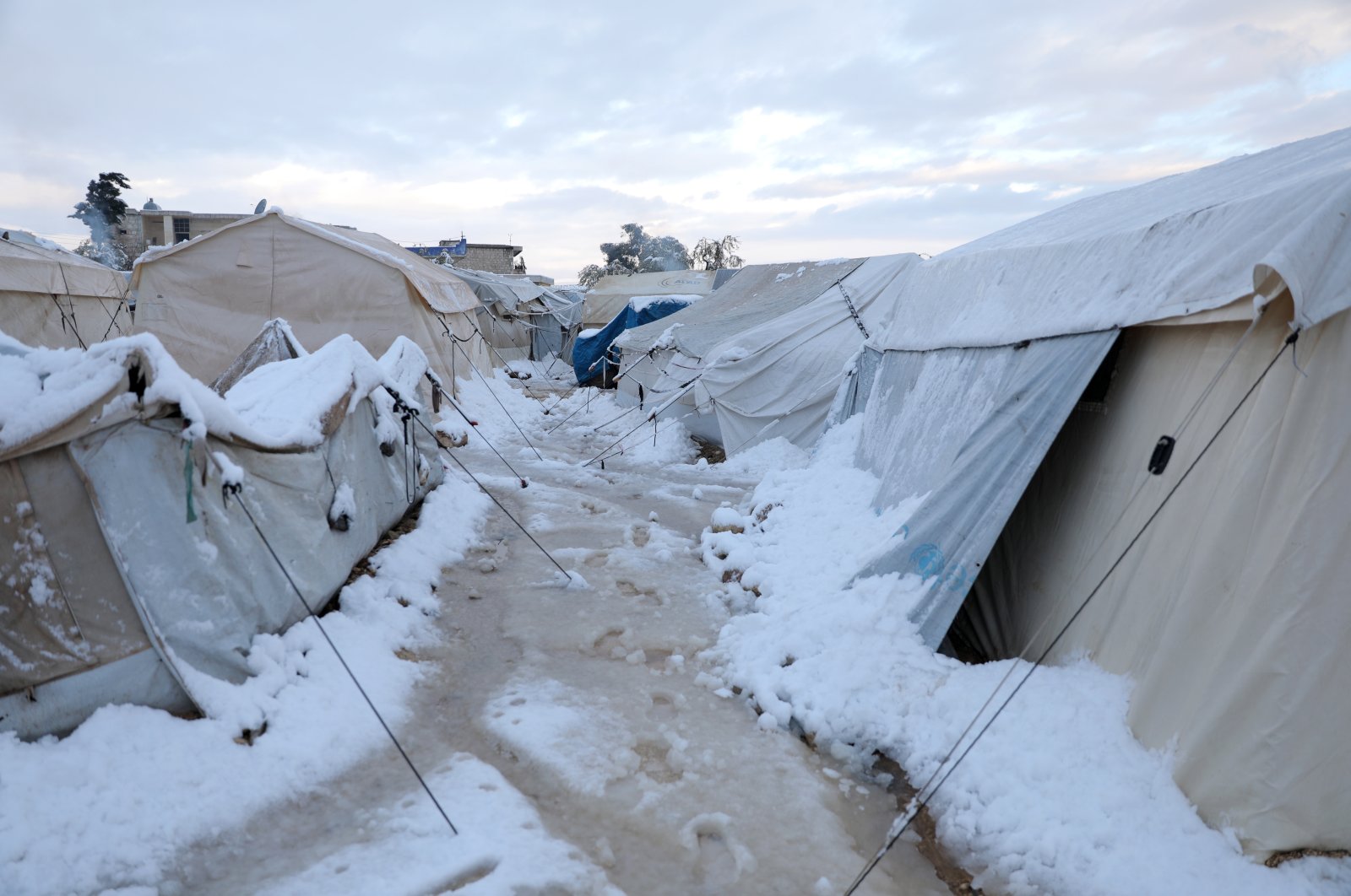 Snow covers Salat Zagrous Camp for internally displaced Syrians, in the Afrin District, Aleppo Governorate, northern Syria, Jan. 19, 2022. (EPA Photo)
