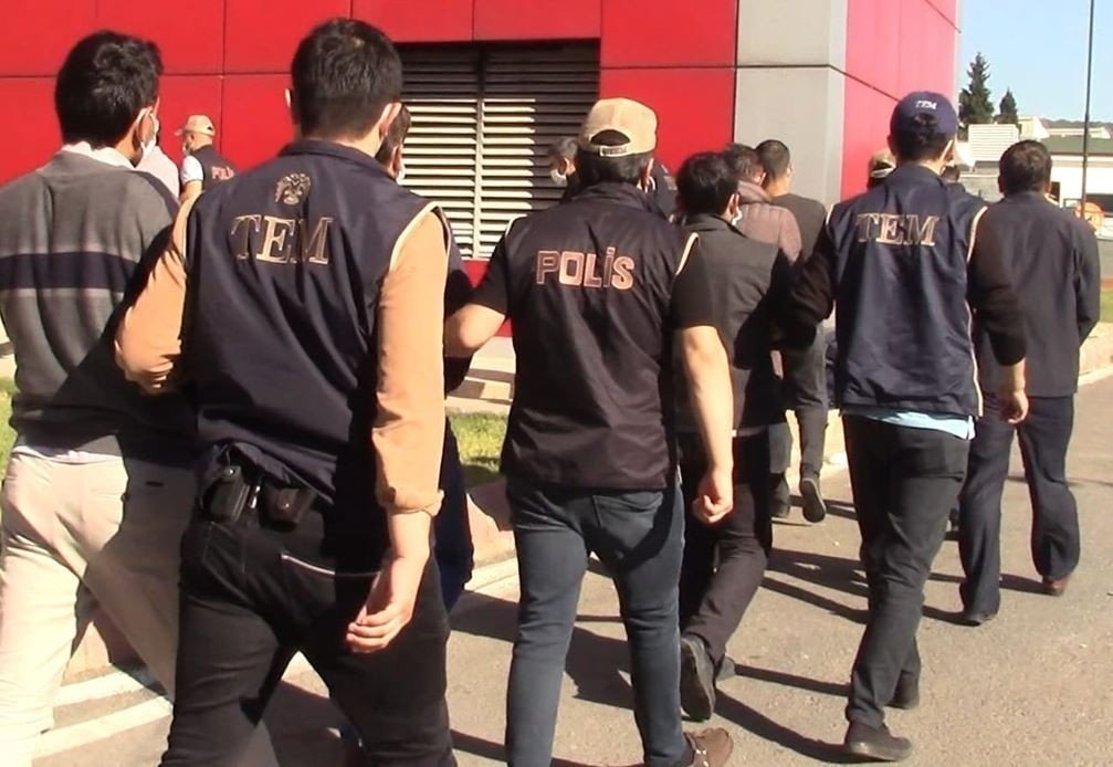 Police escort FETÖ suspects captured in an operation in Denizli, western Turkey, Jan. 17, 2022. (İHA PHOTO) 