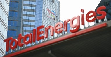 The new TotalEnergies logo is seen during its unveling ceremony, at a charging station in La Defense on the outskirts of Paris, France, May 28, 2021. (AFP Photo)