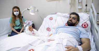Dr. Ertan Iskender, repeatedly stabbed by a patient, lies in his hospital bed in the capital Ankara, Turkey, May 31, 2021. (AA PHOTO)