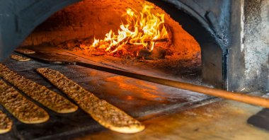 Etli ekmek, a pizza-like flatbread topped with meat, is one of the famed dishes of Konya cuisine but the city offers so much more. (Shutterstock Photo)