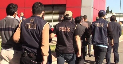 Police escort FETÖ suspects captured in an operation in Denizli, western Turkey, Jan. 17, 2022. (İHA PHOTO) 