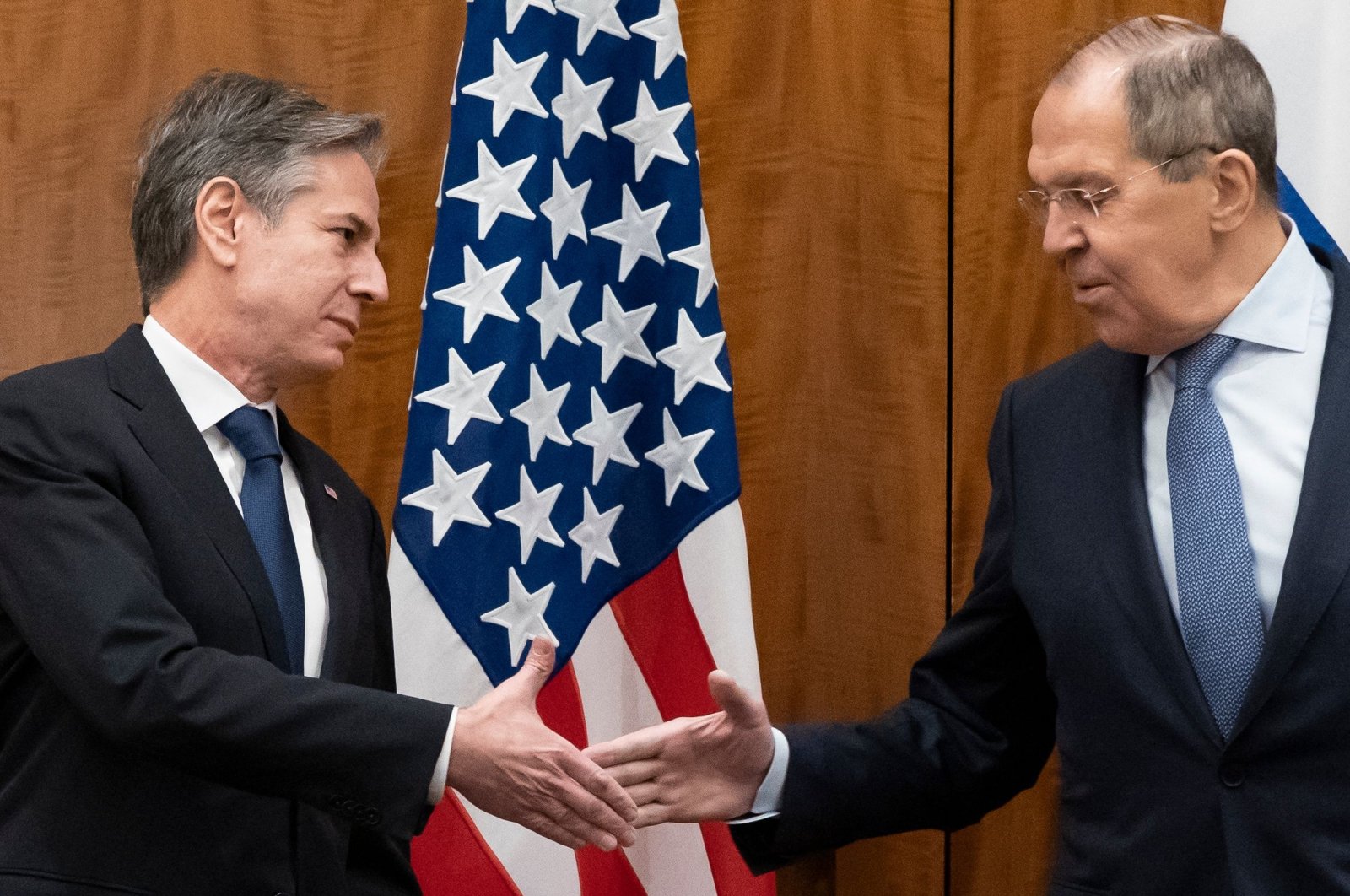 U.S. Secretary of State Antony Blinken (L) and Russian Foreign Minister Sergey Lavrov shake hands before their meeting in Geneva, Switzerland, Jan. 21, 2022. (AFP Photo)