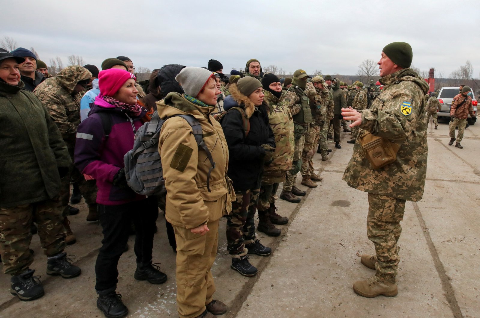 Reservists of the Ukrainian Territorial Defence Forces listen to instructions during military exercises at a training ground outside Kharkiv, Ukraine, Dec. 11, 2021. (Reuters Photo)