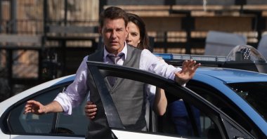 Tom Cruise, foreground, and Hayley Atwell appear during the filming of the movie "Mission: Impossible 7" in Rome, Italy, Oct. 13, 2020. (AP)