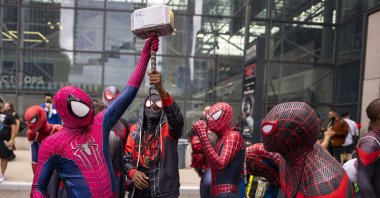 Attendees dressed as Spider-Man gather during New York Comic Con at the Jacob K. Javits Convention Center in New York, U.S., Oct. 9, 2021. (AP Photo)