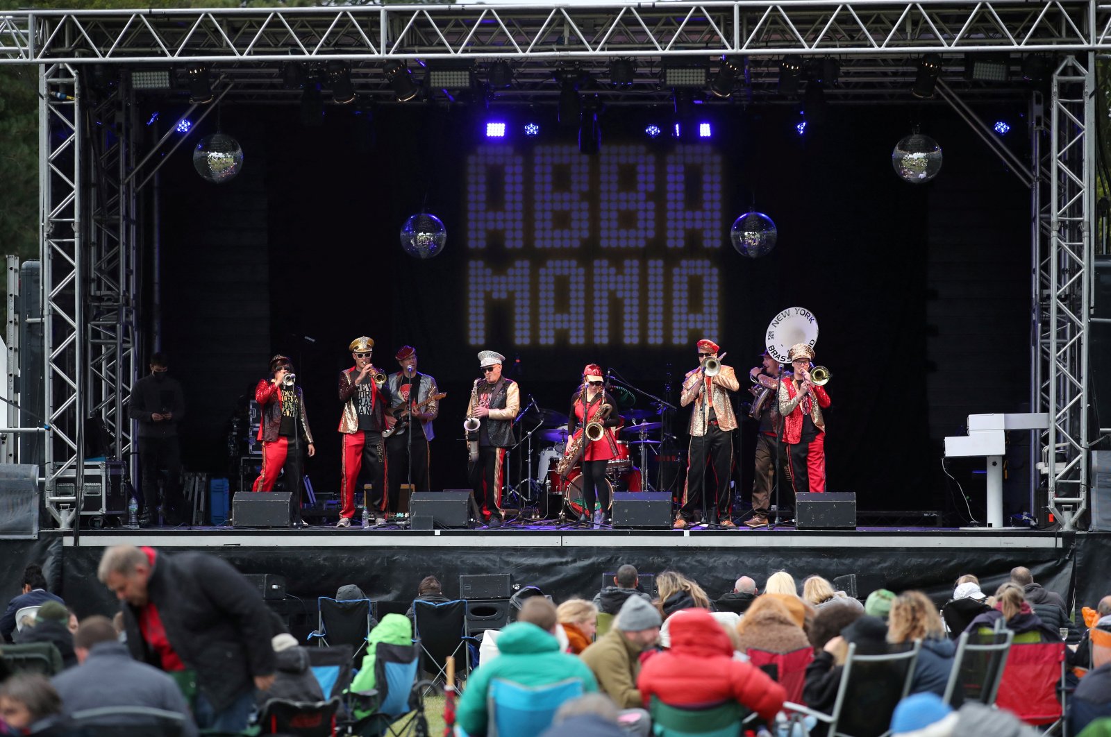 The New York Brass Band performs at the ABBA Mania concert amid the spread of the coronavirus disease at Scampston Hall in Malton, Yorkshire, Britain, Aug. 29, 2020. (Reuters Photo)