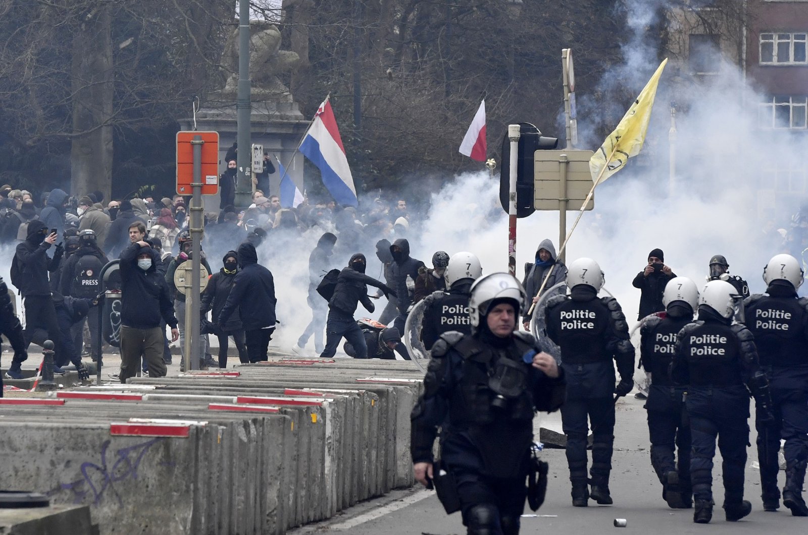 Police confront protestors during a demonstration against COVID-19 measures in Brussels, Belgium, Jan. 23, 2022. (AP Photo)